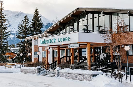 Lobstick Lodge exterior in winter.