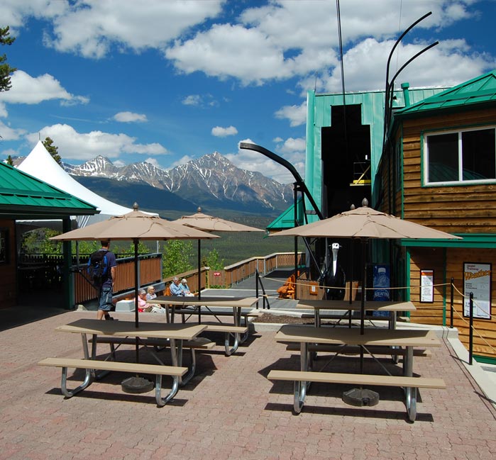 Basecamp picnic tables with mountain view