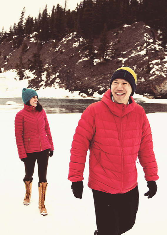 Guests walk on Frozen Lake Minnewanka