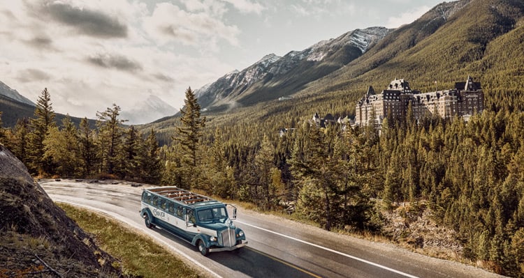 Open Top Tour driving past the Banff Springs Hotel