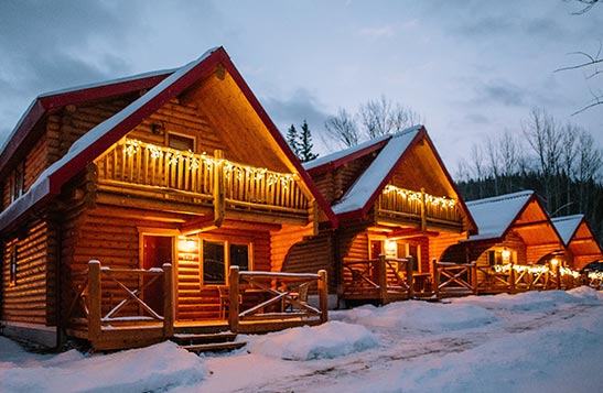 Red-topped Miette Mountain Cabins in Winter at Night